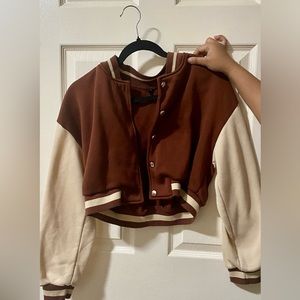 It’s a cute brown sweater